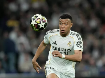 Real Madrid's Kylian Mbappe watches the ball during the Champions League quarterfinal first leg soccer match between Real Madrid and Bayern Munich in Madrid, Spain, Tuesday, April 7, 2026. (AP Photo/Bernat Armangue)