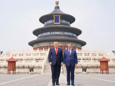 President Donald Trump, right, stands with Chinese President Xi Jinping at the Temple of Heaven on Thursday May 14, 2026, in Beijing. (AP Photo/Mark Schiefelbein)