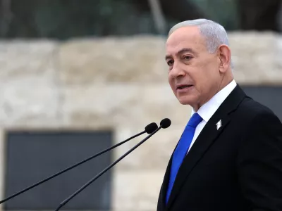 FILE - Israel's Prime Minister Benjamin Netanyahu attends a ceremony at the Military Cemetery on Mount Herzl in Jerusalem, April 21, 2026. (Ilia Yefimovich/Pool Photo via AP, File)