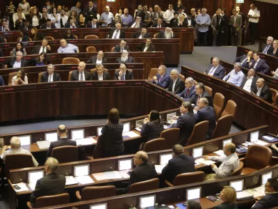 Israeli Ministers and Parliament Members in their chairs before voting in the Knesset, Israel's parliament in Jerusalem, Wednesday, May 29, 2019. Israel's parliament has voted to dissolve itself, sending the country to an unprecedented second snap election this year as Prime Minister Benjamin Netanyahu failed to form a governing coalition before a midnight deadline. (AP Photo/Sebastian Scheiner)