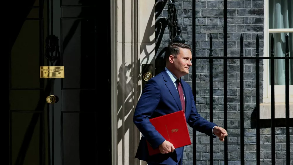 FILE PHOTO: British Health Secretary Wes Streeting walks after attending a cabinet meeting at Downing Street, the day before the State Opening of Parliament, in London, Britain, May 12, 2026. REUTERS/Jack Taylor/File Photo
