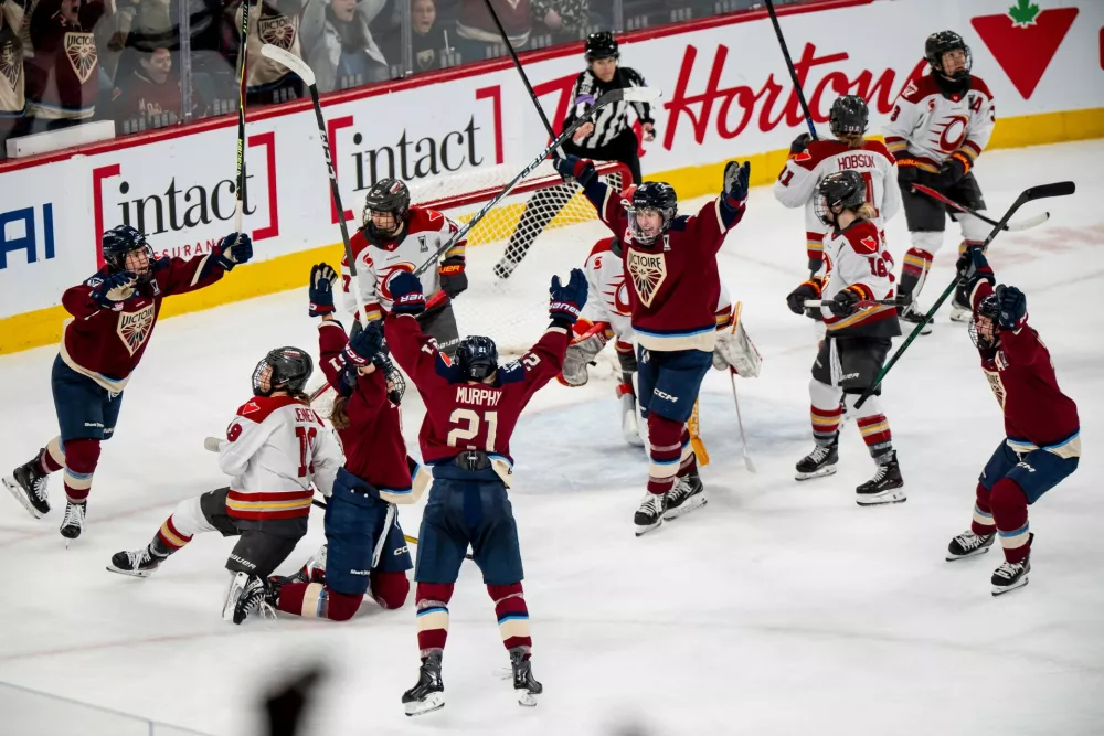 Montreal Victoire's Nicole Gosling (third left) celebrates her goal against the Ottawa Charge with teammates during the third period PWHL playoff hockey action in Laval, Quebec, on Thursday, May 14, 2026. (Christopher Katsarov/The Canadian Press via AP)