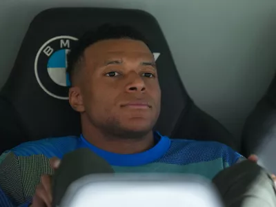 Real Madrid's Kylian Mbappe looks out from the bench prior to the Spanish La Liga soccer match between Real Madrid and Real Oviedo in Madrid, Spain, Thursday, May 14, 2026. (AP Photo/Manu Fernandez)