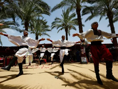 Palestinians attend an event to mark the 78th anniversary of the Nakba, in Zawayda, in the central Gaza Strip, May 14, 2026. REUTERS/Mahmoud Issa