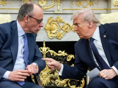 FILE PHOTO: U.S. President Donald Trump and German Chancellor Friedrich Merz meet in the Oval Office at the White House in Washington, D.C., U.S., March 3, 2026. REUTERS/Jonathan Ernst/File Photo