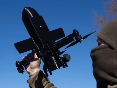 FILE - An instructor from the Ukrainian company General Cherry demonstrates the operation of an anti-air interceptor drone designed to destroy Russian attack drones in Kyiv region, on March 11, 2026. (AP Photo/Efrem Lukatsky, File)