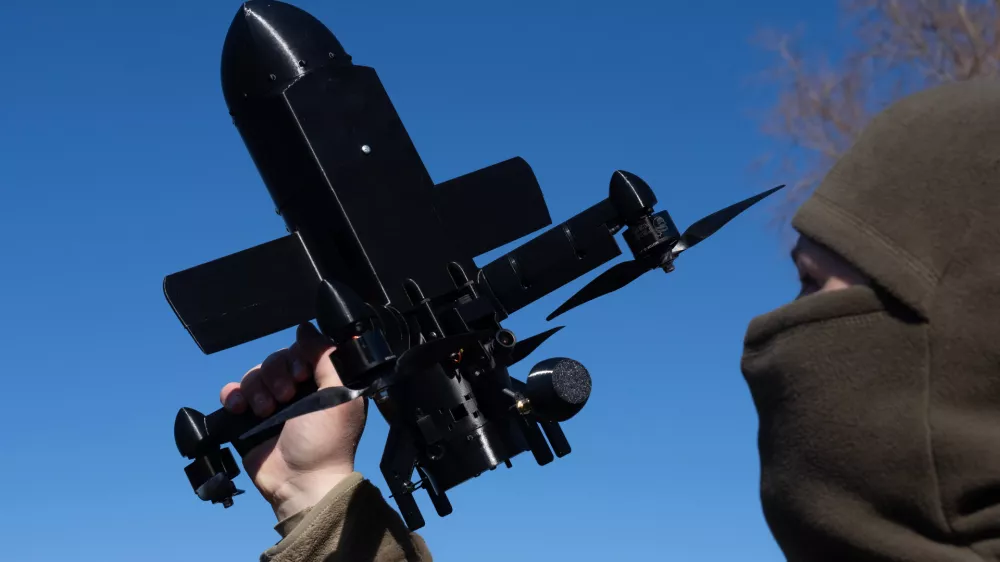 FILE - An instructor from the Ukrainian company General Cherry demonstrates the operation of an anti-air interceptor drone designed to destroy Russian attack drones in Kyiv region, on March 11, 2026. (AP Photo/Efrem Lukatsky, File)