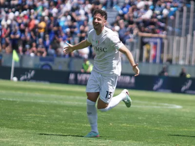 Napoli's Amir Rrahmani celebrates after scoring during the Serie A soccer match between Pisa and Napoli in Pisa, Italy, Sunday May 17 2026. (Alessandro La Rocca/LaPresse via AP)