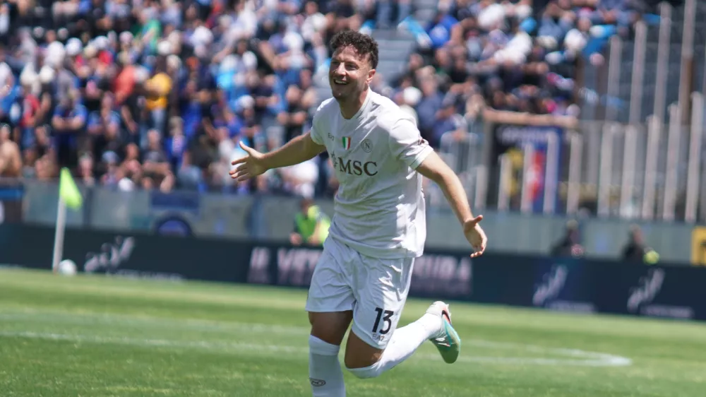 Napoli's Amir Rrahmani celebrates after scoring during the Serie A soccer match between Pisa and Napoli in Pisa, Italy, Sunday May 17 2026. (Alessandro La Rocca/LaPresse via AP)
