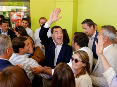 Andalusian regional president and People's Party (PP) candidate, Juanma Moreno Bonilla, reacts during a rally campaign ahead of the Andalusian regional elections, in Seville, Spain, May 15, 2026. REUTERS/Marcelo del Pozo