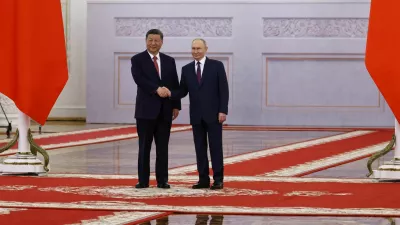 Russian President Vladimir Putin shakes hands with his Chinese counterpart Xi Jinping during a welcoming ceremony before their talks at the Kremlin in Moscow, Russia, May 8, 2025. REUTERS/Evgenia Novozhenina/Pool