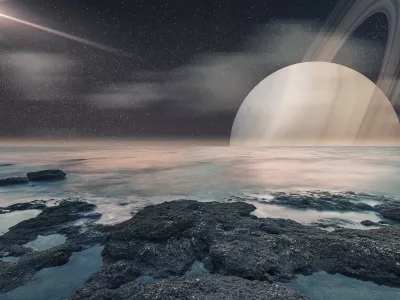 Pogled na Saturn s Titana, kot si ga je predstavljal umetnik. / Foto: Istock