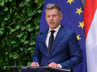 Hungarian Prime Minister Peter Magyar speaks during a press conference following the meeting of the government in Budapest, Hungary, Monday, May 18, 2026. (Robert Hegedus/MTI via AP)