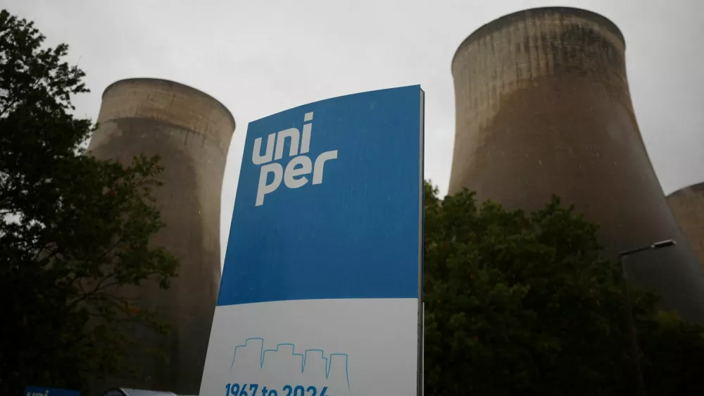 FILE PHOTO: File Photo: Signage is seen in front of the cooling towers at Uniper's Ratcliffe-on-Soar power station the day after it was taken offline, in Ratcliffe-on-Soar, Britain, October 1, 2024. REUTERS/Phil Noble/File Photo/File Photo