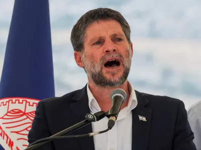 FILE PHOTO: Israeli Finance Minister Bezalel Smotrich speaks at a press conference regarding settlements expansion for the long-frozen E1 settlement, that would split East Jerusalem from the occupied West Bank, near the Israeli settlement of Maale Adumim in the Israeli-occupied West Bank, August 14, 2025. REUTERS/Ronen Zvulun/File Photo