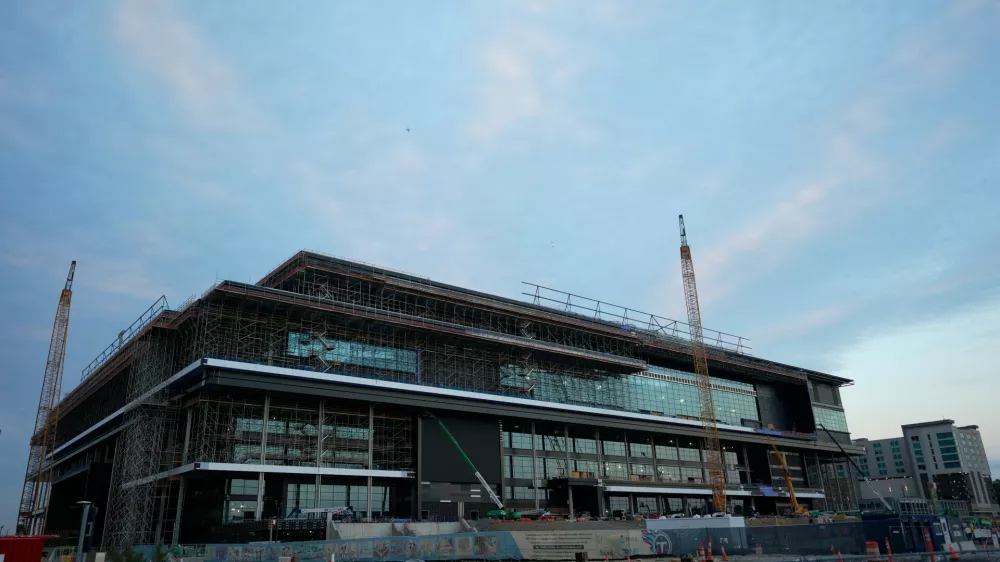 FILE - Construction continues on a new enclosed stadium for the Tennessee Titans NFL football team Monday, May 18, 2026, in Nashville, Tenn. (AP Photo/George Walker IV, File)