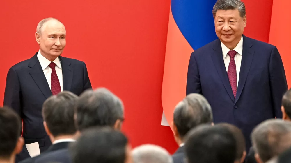 Russian President Vladimir Putin, left, and Chinese President Xi Jinping attend an opening ceremony of the China-Russia Years of Education at the Great Hall of the People in Beijing, Wednesday, May 20, 2026. (Kristina Solovyova, Sputnik, Kremlin Pool Photo via AP)