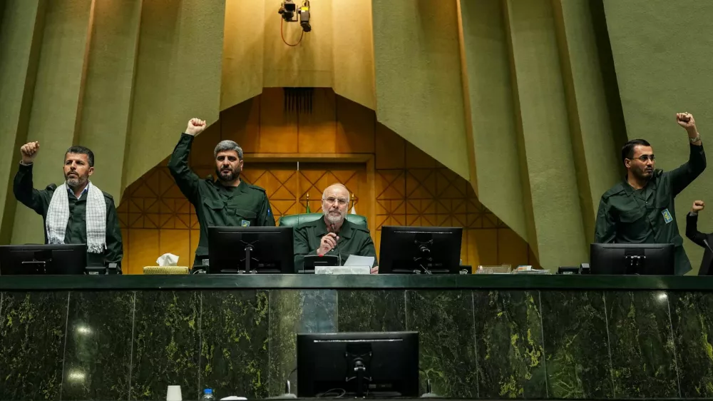Iranian Parliament Speaker Mohammad-Bagher Ghalibaf looks on as parliament members chant in support of the IRGC while wearing military uniforms in Tehran, Iran, February 1, 2026. Hamed Malekpour/Islamic consultative assembly news agency/WANA (West Asia News Agency)/Handout via REUTERS ATTENTION EDITORS - THIS PICTURE WAS PROVIDED BY A THIRD PARTY.
