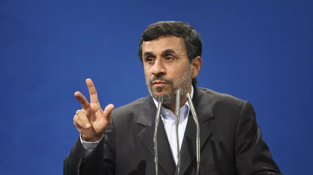 FILE - In this Oct. 29,. 2011file photo, Iranian President Mahmoud Ahmadinejad gestures as he delivers a speech during a meeting with guests of The Press Union of the Islamic World, at the presidency compound, Tehran, Iran. Iran is ready to revive talks with the world powers, President Mahmoud Ahmadinejad said Thursday, Jan. 26, 2012 as toughening sanctions aim at forcing Tehran to sharply scale back its nuclear program. (AP Photo/Vahid Salemi, File)
