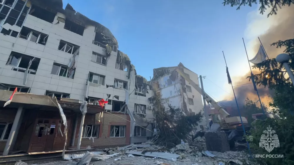 Rescuers work amid debris of a destroyed dormitory building of the Starobilsk College of Luhansk Pedagogical University following an overnight attack, what Russian-installed authorities called a Ukrainian drone strike, in the course of the Russia-Ukraine conflict in the town of Starobilsk (Starobelsk) in the Luhansk region, a Russian-controlled area of Ukraine, May 22, 2026, in this still image taken from video. Russian Emergencies Ministry in Lugansk Region/Handout via REUTERS ATTENTION EDITORS - THIS IMAGE WAS PROVIDED BY A THIRD PARTY. NO RESALES. NO ARCHIVES. MANDATORY CREDIT. WATERMARK FROM SOURCE.