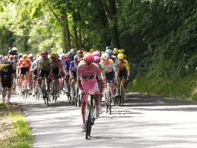 Portugal's Afonso Oliveira Eulalio of Bahrain Victorious, front, during the 12th stage of the Giro d'Italia cycling race, from Imperia to Novi Ligure, Italy, Thursday, May 21, 2026. (Marco Alpozzi/LaPresse via AP)