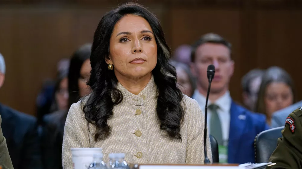 FILE - Director of National Intelligence Tulsi Gabbard listens during the Senate Committee on Intelligence hearings on Capitol Hill, March 18, 2026, in Washington. (AP Photo/Jose Luis Magana, File)