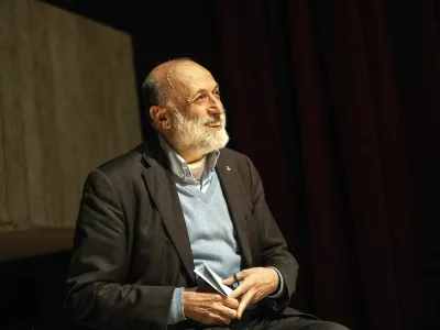 Carlo Petrini, founder of the Italian 'Slow Food' movement that promotes quality food, genuine ingredients and local produce, attends an event in this undated handout picture. SLOW FOOD/Handout via REUTERS THIS IMAGE HAS BEEN SUPPLIED BY A THIRD PARTY. NO ARCHIVES, NO RESALES. MANDATORY CREDIT.
