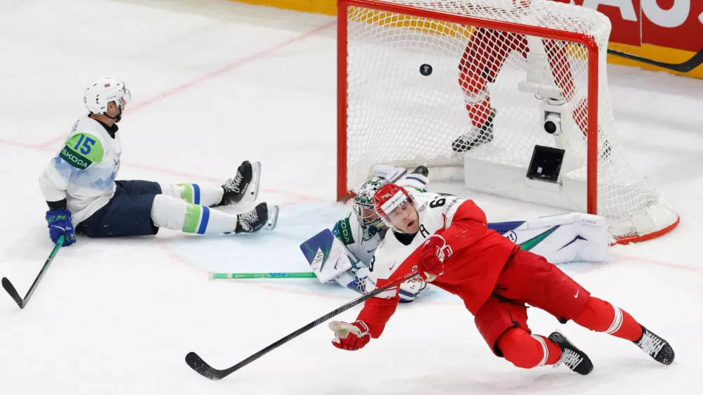Ice Hockey - IIHF World Championships - Group B - Denmark v Slovenia - BCF Arena, Fribourg, Switzerland - May 23, 2026 Denmark's Patrick Russell scores their third goal REUTERS/David W Cerny   TPX IMAGES OF THE DAY