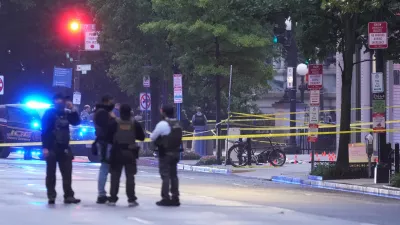 U.S. Secret Service Police are seen on a crime scene after responding to reports of shots fired near the White House, Saturday, May 23, 2026, in Washington. (AP Photo/Alex Brandon)
