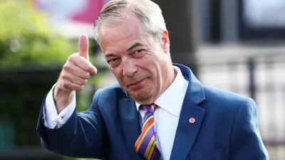Britain's Reform UK leader Nigel Farage gestures at the Havering Town Hall, following the results of the local elections, in the London Borough of Havering, Britain, May 8, 2026. REUTERS/Jack Taylor