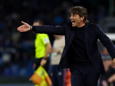 FILE - Napoli's head coach Antonio Conte shouts during a Serie A soccer match between Napoli and Cremonese, April 24, 2026, in Naples, Italy. (Alessandro Garofalo/LaPresse via AP, File)