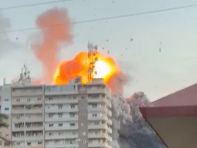 Flames rise following a strike, as the Israeli military says it has begun striking Hezbollah infrastructure in southern Lebanon's Tyre, in Tyre, Lebanon, May 28, 2026, in this screengrab obtained from social media video. Social Media /via REUTERS THIS IMAGE HAS BEEN SUPPLIED BY A THIRD PARTY. NO RESALES. NO ARCHIVES. NEWS USE ONLY.  Verification: - Road layout, buildings and trees matched file and satellite image - Corroborating videos show smoke rising from the same location - Date verified by IDF statement of the attack on Tyre - Israeli military said on Thursday morning that it has begun striking Hezbollah infrastructure in southern Lebanon's Tyre. - Israeli military spokesperson Avichay Adraee warned to attack several locations in Tyre on Thursday morning, including the area where the smoke was seen rising from.