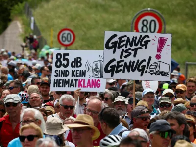 People demonstrate against the growing traffic load on the Brenner motorway between Austria and Italy, near Matrei, Austria, May 30, 2026. The banner reads "Enough is enough". REUTERS/Christian Mang