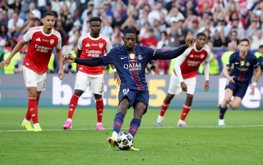 Soccer Football - UEFA Champions League - Final - Paris St Germain v Arsenal - Puskas Arena, Budapest, Hungary - May 30, 2026 Paris St Germain's Ousmane Dembele scores their first goal from the penalty spot REUTERS/Phil Noble