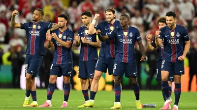 Soccer Football - UEFA Champions League - Final - Paris St Germain v Arsenal - Puskas Arena, Budapest, Hungary - May 30, 2026 Paris St Germain players react during the penalty shootout REUTERS/Angelika Warmuth