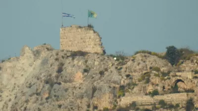 An Israeli flag and a flag of the Golani Brigade are raised on Beaufort Castle, as seen from Marjayoun, southern Lebanon, May 31, 2026. REUTERS/Stringer REFILE - ADDING INFORMATION "A FLAG OF THE GOLANI BRIGADE".   TPX IMAGES OF THE DAY