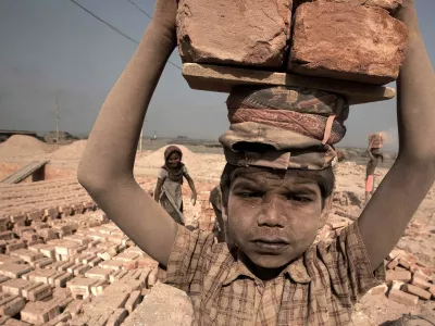 Brickworks Hell - zReportage.com Story of the Week #316- Launched May 11, 2010 - Full multimedia experience: audio, stills, text and or video: Go to to see more. - PICTURED - Feb 15, 2010 - Dhaka, Bangladesh - People come from all over Bangladesh to work at the brick factories on outskirts of Dhaka to work 7 months a year for 100 Dhakas a day.,Image: 39219082, License: Rights-managed, Restrictions: * Korea Rights OUT *, Model Release: no 