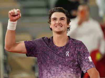 Brazil's Joao Fonseca reacst after winning the fourth-round tennis match against Norway's Casper Ruud at the French Open in Paris, Monday, June 1, 2026. (AP Photo/Thibault Camus)