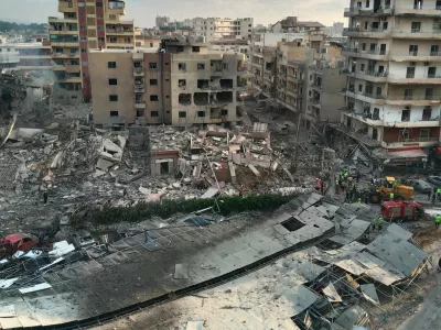 Rescuers work at the site of an Israeli airstrike that hit a building and damaged a hospital in the southern port city of Tyre, Lebanon, Monday, June 1, 2026. (AP Photo)