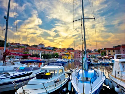 Sali village sunset in harbor vertical view, island of Dugi otok in Croatia