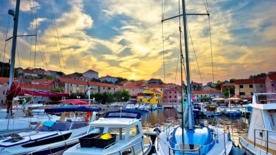 Sali village sunset in harbor vertical view, island of Dugi otok in Croatia