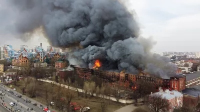 Flames and smoke rise during a fire at the Nevskaya Manufaktura factory in central Saint Petersburg, Russia April 12, 2021. Picture taken with a drone. REUTERS/Anton Vaganov