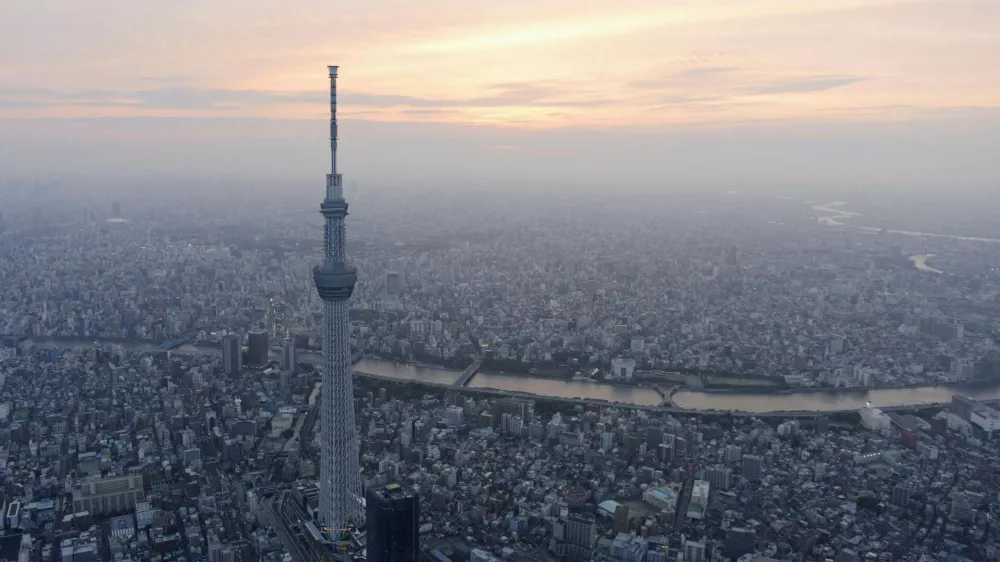 A view of Tokyo Skytree, the world's tallest broadcasting tower at 634 metres (2080 feet), in Tokyo in this photo taken by Kyodo on May 21, 2012. The tower opened to the public on Tuesday, with hundreds of people entering the tower and its large shopping mall. Picture taken May 21, 2012. Mandatory Credit REUTERS/Kyodo (JAPAN - Tags: BUSINESS CONSTRUCTION SOCIETY MEDIA) FOR EDITORIAL USE ONLY. NOT FOR SALE FOR MARKETING OR ADVERTISING CAMPAIGNS. THIS IMAGE HAS BEEN SUPPLIED BY A THIRD PARTY. IT IS DISTRIBUTED, EXACTLY AS RECEIVED BY REUTERS, AS A SERVICE TO CLIENTS. MANDATORY CREDIT. JAPAN OUT. NO COMMERCIAL OR EDITORIAL SALES IN JAPAN. YES