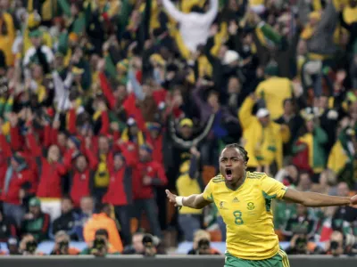 South Africa's Siphiwe Tshabalala celebrates after scoring against Mexico during the 2010 World Cup opening match at Soccer City stadium in Johannesburg June 11, 2010.     REUTERS/Henry Romero (SOUTH AFRICA - Tags: SPORT SOCCER WORLD CUP)