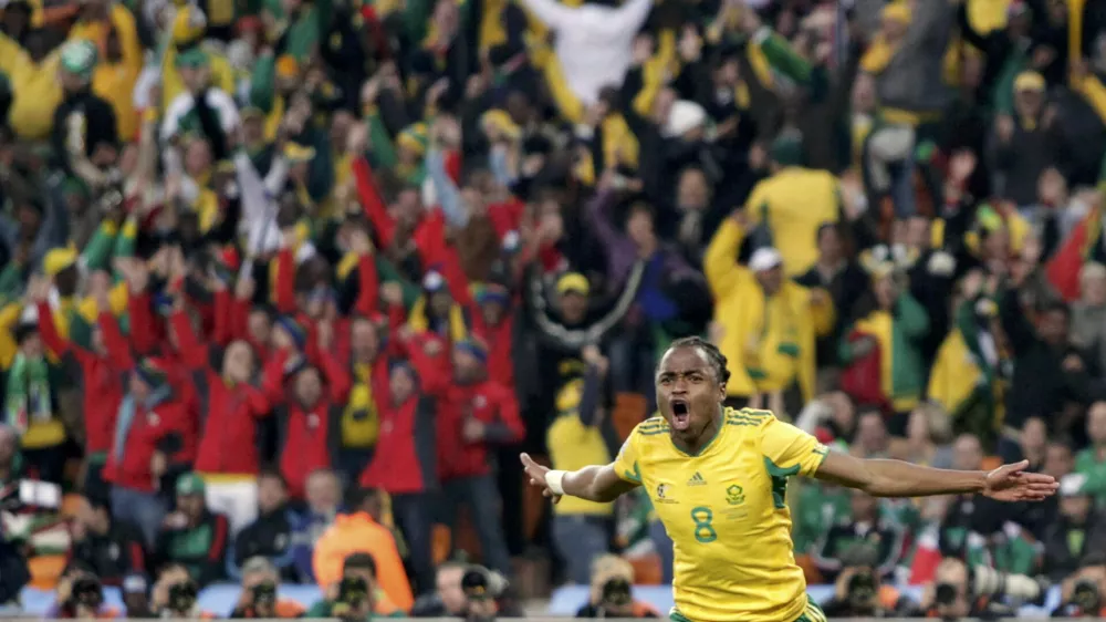 South Africa's Siphiwe Tshabalala celebrates after scoring against Mexico during the 2010 World Cup opening match at Soccer City stadium in Johannesburg June 11, 2010.     REUTERS/Henry Romero (SOUTH AFRICA - Tags: SPORT SOCCER WORLD CUP)