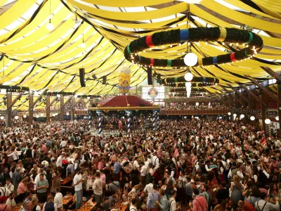 People visit Paulaner tent on the day of the official opening of the 190th Oktoberfest, the world's largest beer festival in Munich, Germany, September 20, 2025. REUTERS/Maryam Majd