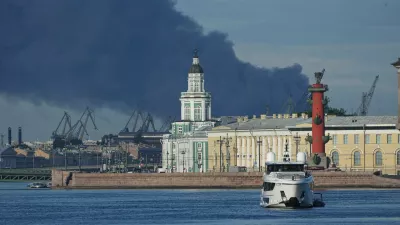 A plume of black smoke is seen over the port of St. Petersburg, Russia, Wednesday, June 3, 2026, after a Ukrainian drone attack. (AP Photo)