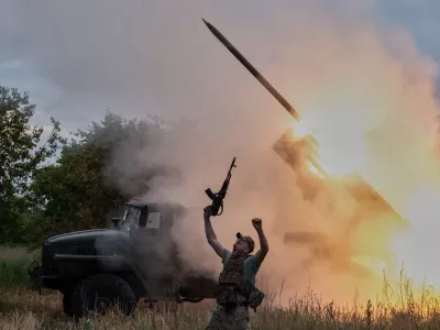 In this photo provided by Ukraine's 93rd Kholodnyi Yar Separate Mechanized Brigade press service, a soldier reacts as an MRLS BM-21 "Grad" fires at the Russian positions near Kostiantynivka, Donetsk region, Ukraine, Thursday, June 4, 2026. (Iryna Rybakova/Ukraine's 93rd Mechanized Brigade via AP)