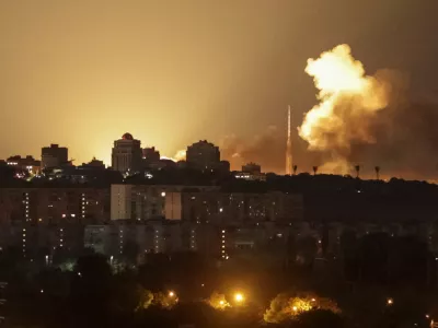 An explosion lights up the sky over the city during a Russian missile and drone strike, amid Russia's attack on Ukraine, in Kyiv, Ukraine June 2, 2026. REUTERS/Vladyslav Sodel
