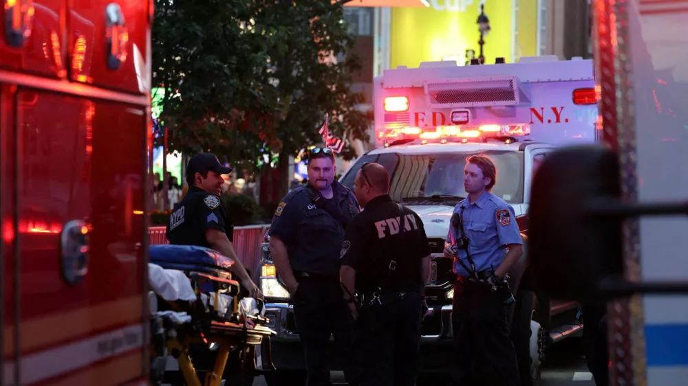 New York Police officers and firefighters gather after reports of a stabbing incident at Penn Station in New York City, U.S. June 7, 2026. REUTERS/Jeenah Moon